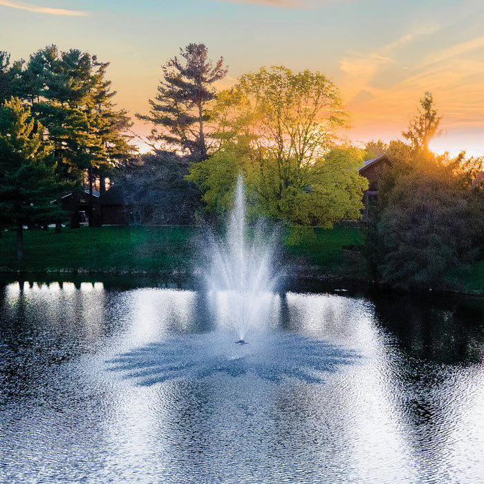 Scott Aerator Amherst Fountain in front of house during sunset