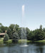 Scott Aerator Jet Stream Fountain with pine trees in background