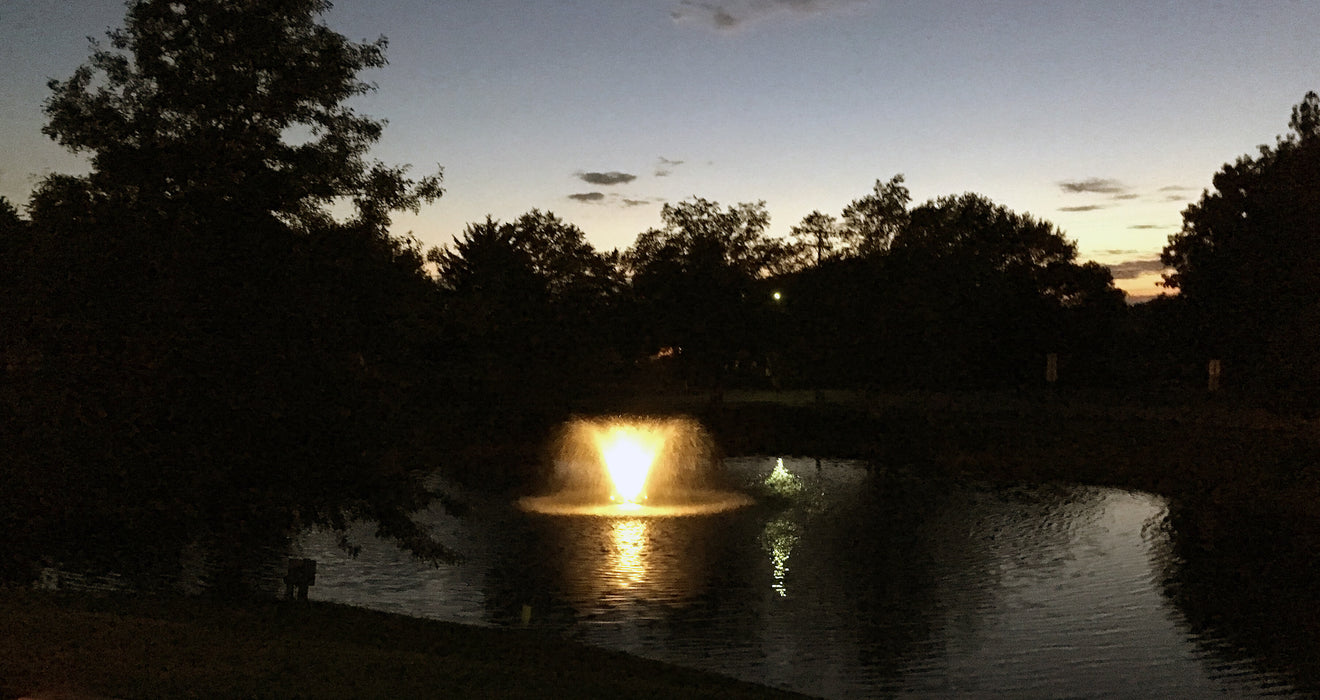 Scott Aerator Night Glo LED Residential Fountain Lights on a lake at night