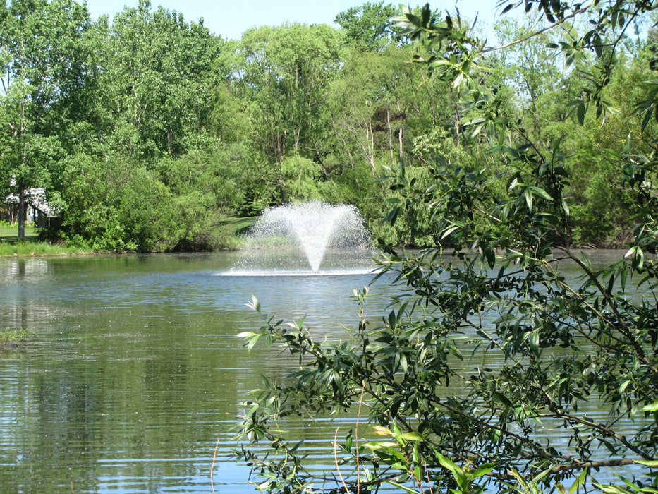 Scott Aerator North Star Fountain Aerator on lake from medium distance away