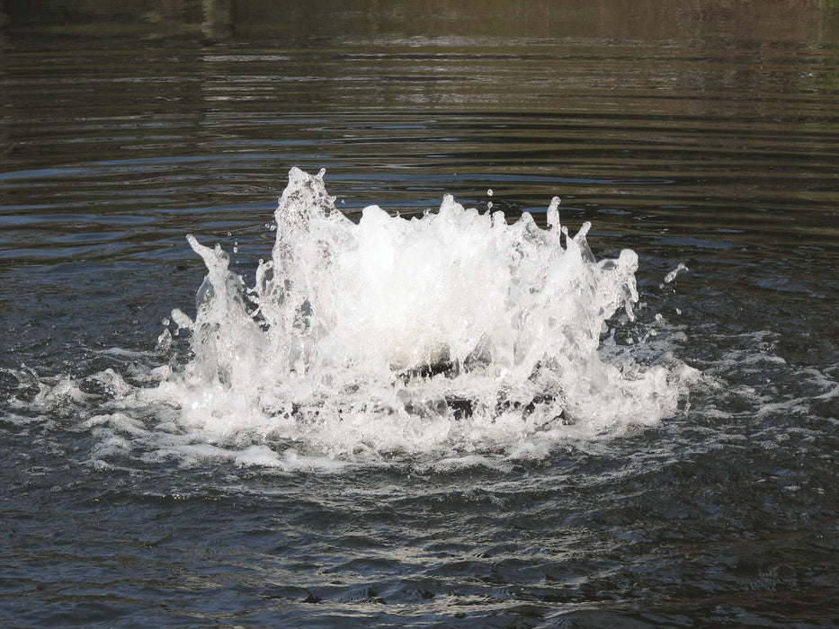 Scott Aerator Boilermaker Surface Aerator closeup in pond with foaming fountain